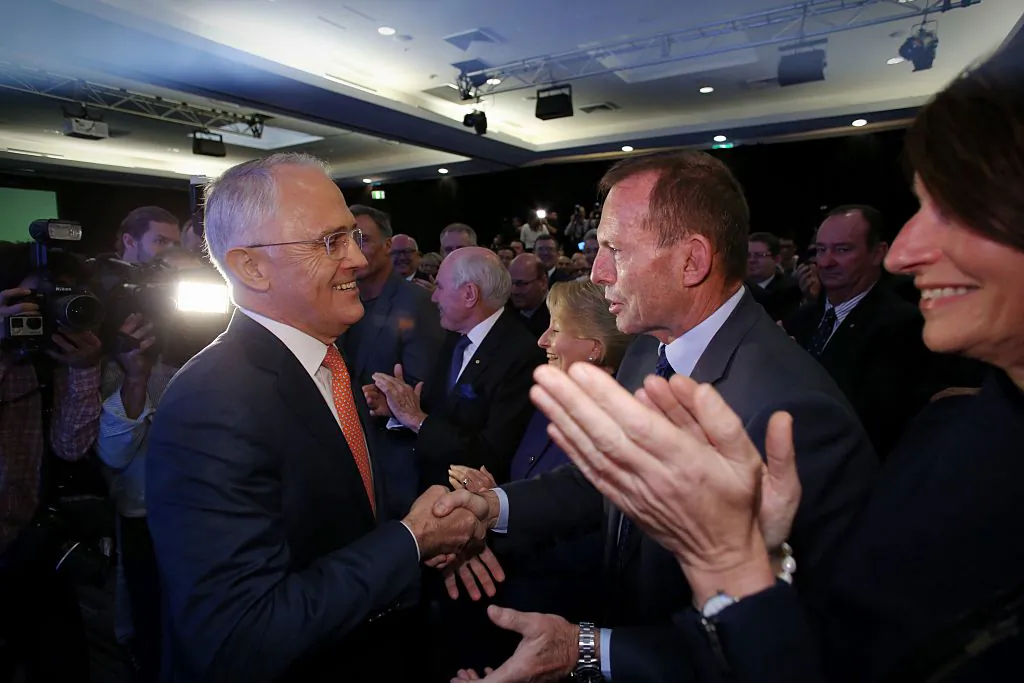 Former Prime Minister Malcolm Turnbull greeted Tony Abbott before he addressed the Coalition national campaign rally during the Liberal Party 2016 Federal Campaign Launch in Sydney, Australia, on June 26, 2016. (Andrew Meares-Pool/Getty Images)