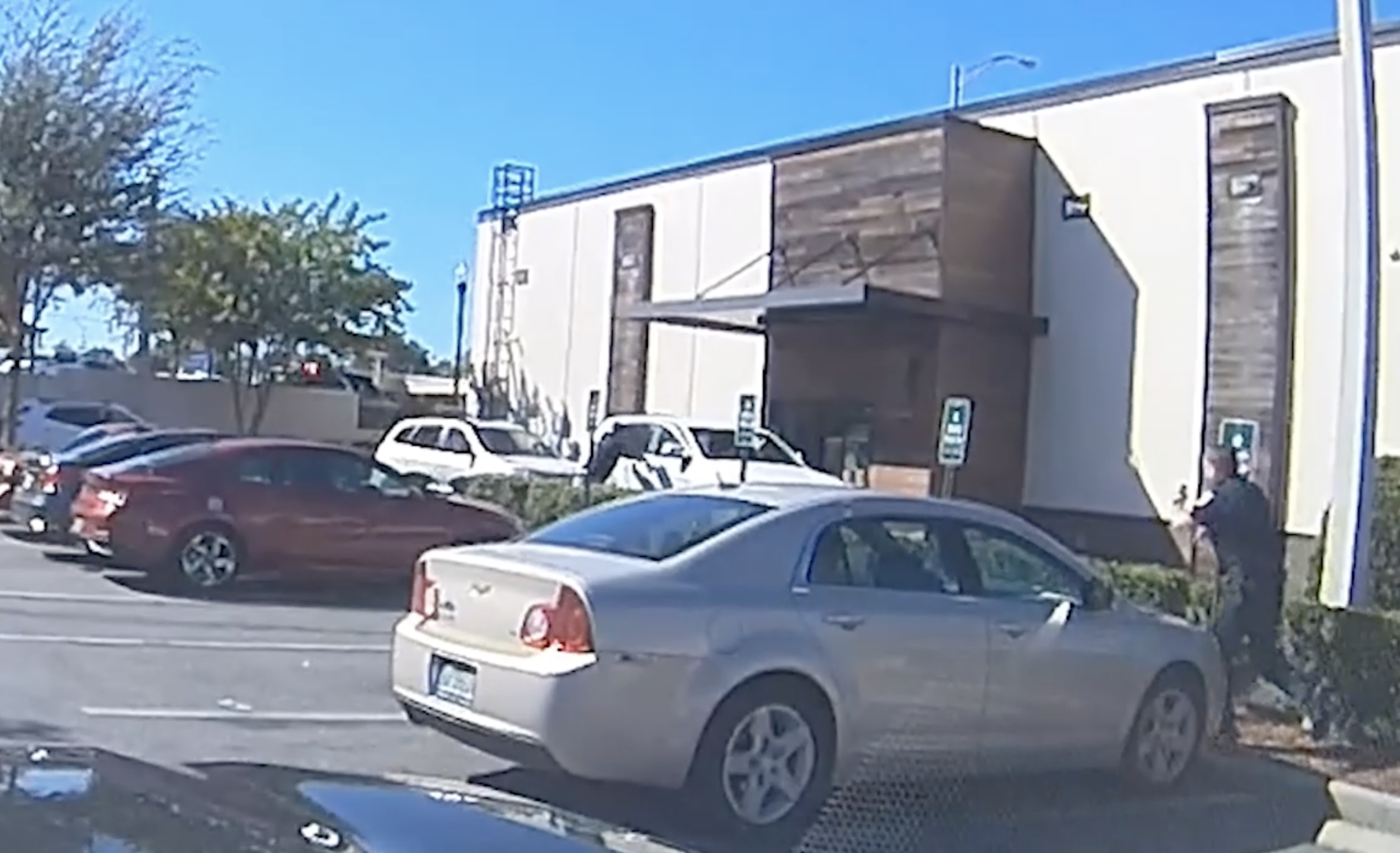 Screenshot of a video that shows Mr. Prouty fleeing the scene. 