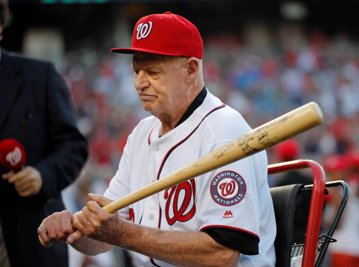 Former Washington Senators player Frank Howard grips a baseball bat during a pregame ceremony at Nationals Park in Washington on Aug. 26, 2016. (Pablo Martinez Monsivais/AP Photo)