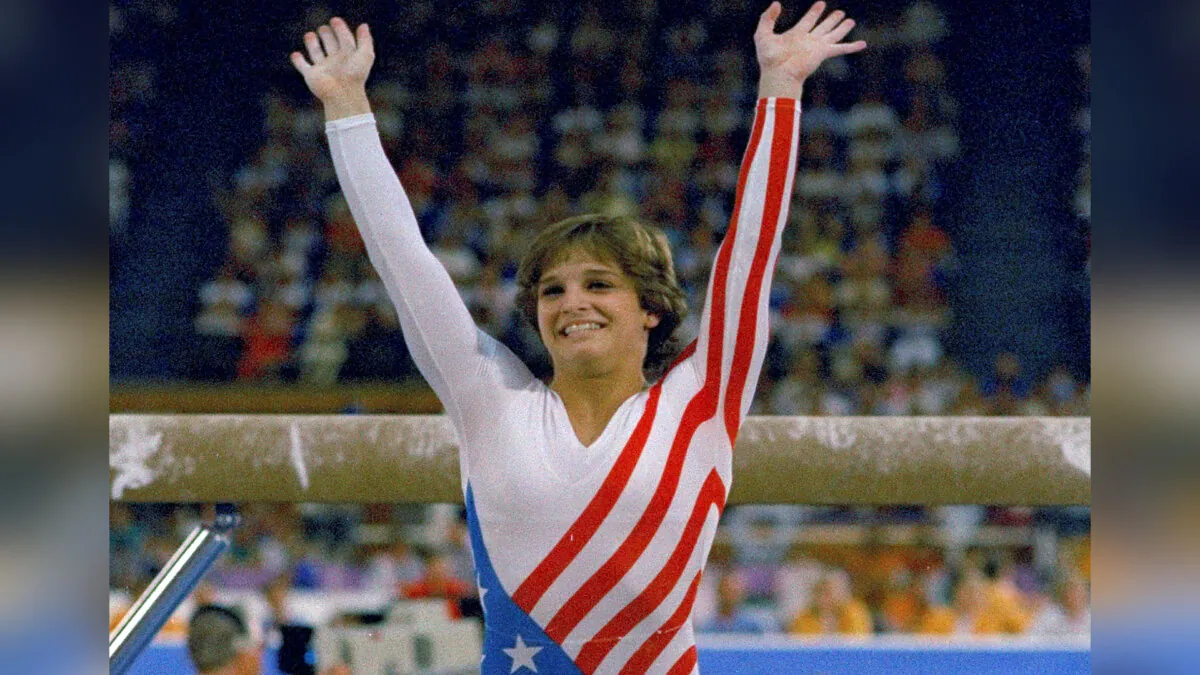 Mary Lou Retton reacts to applause after her performance at the Summer Olympics in Los Angeles on Aug. 3, 1984. (Suzanne Vlamis/AP Photo)