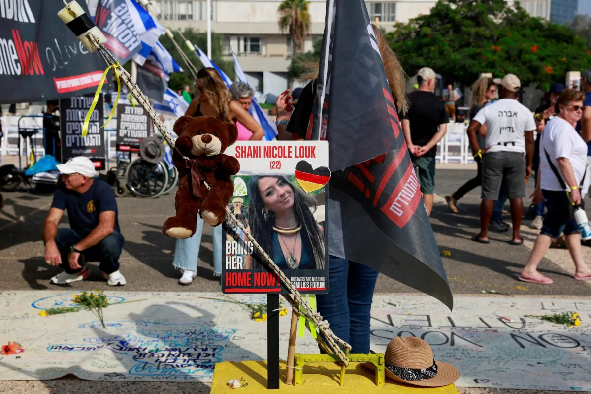 A picture of Shani Nicole Louk is displayed during a demonstration by family members and supporters in Tel Aviv, Israel, on Oct. 28, 2023. (Ammar Awad/Reuters)