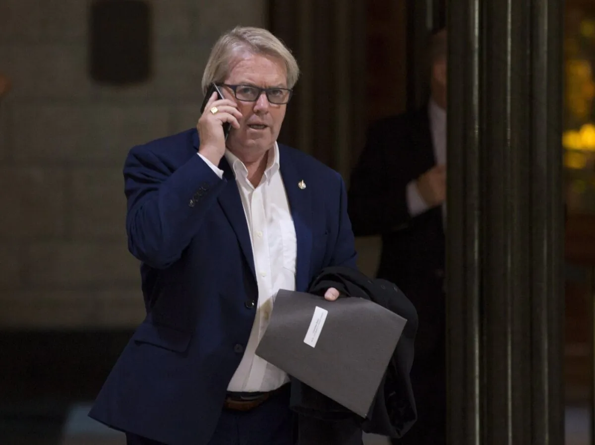 Liberal MP Rodger Cuzner makes his way to caucus on Parliament Hill in Ottawa on October 18, 2017. (The Canadian Press/Adrian Wyld)
