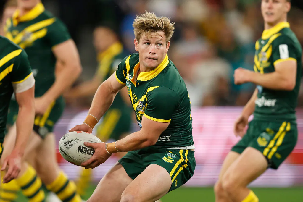 Harry Grant of Australia passes the ball during the Men's pacific Championship match between Australia Kangaroos and New Zealand Kiwis at AAMI Park in Melbourne, Australia, on Oct. 28, 2023. (Daniel Pockett/Getty Images)