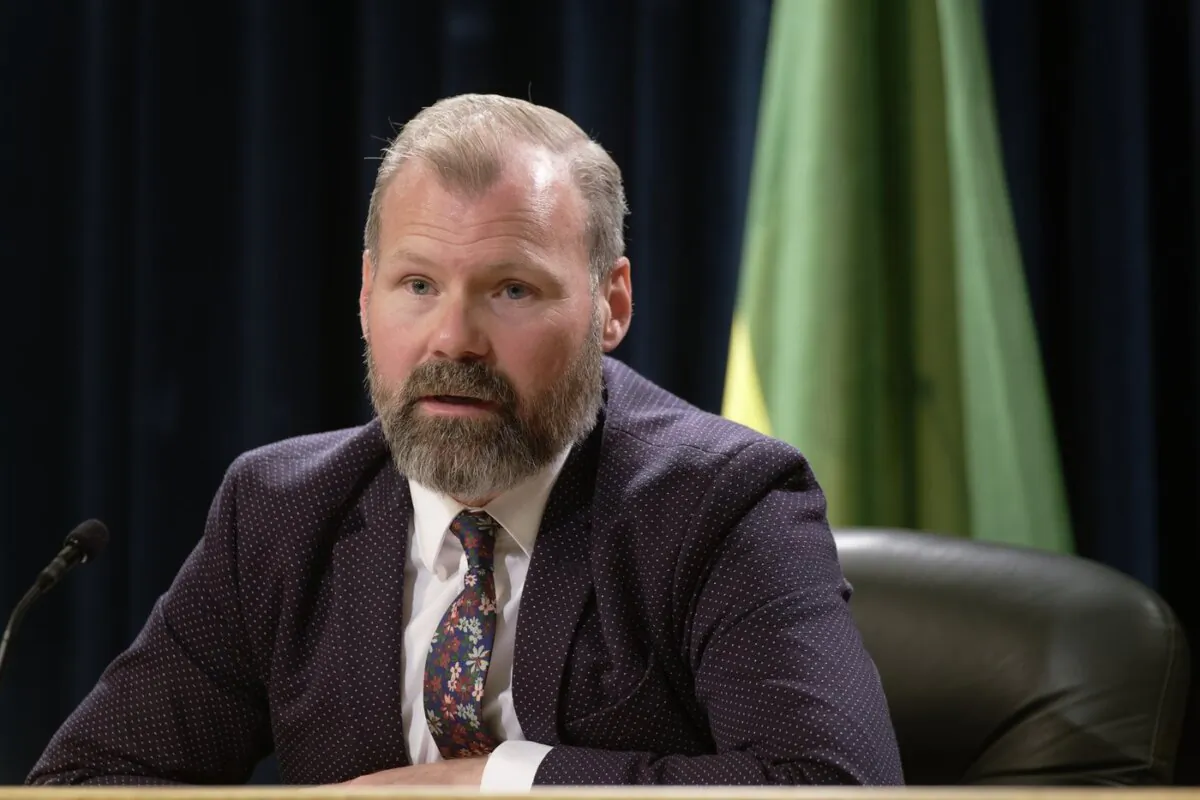 Dustin Duncan, the minister responsible for SaskEnergy, speaks during a policy announcement at the Legislative Building in Regina on Aug. 22, 2023. (The Canadian Press/Michael Bell)
