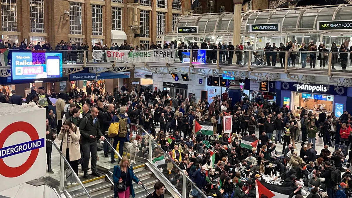 Protesters staging a sit-in, organised by Sisters Uncut, at Liverpool Street station in London on Oct. 31, 2023. (Sisters Uncut/PA Wire) 