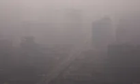 Haze Lingers in Beijing as Fog Blankets Parts of North China