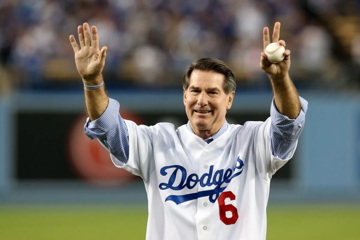 Los Angeles Dodgers legend Steve Garvey throws out a ceremonial first pitch before the Dodgers take on the Atlanta Braves in Game Four of the National League Division Series at Dodger Stadium in Los Angeles on Oct. 7, 2013. (Stephen Dunn/Getty Images)