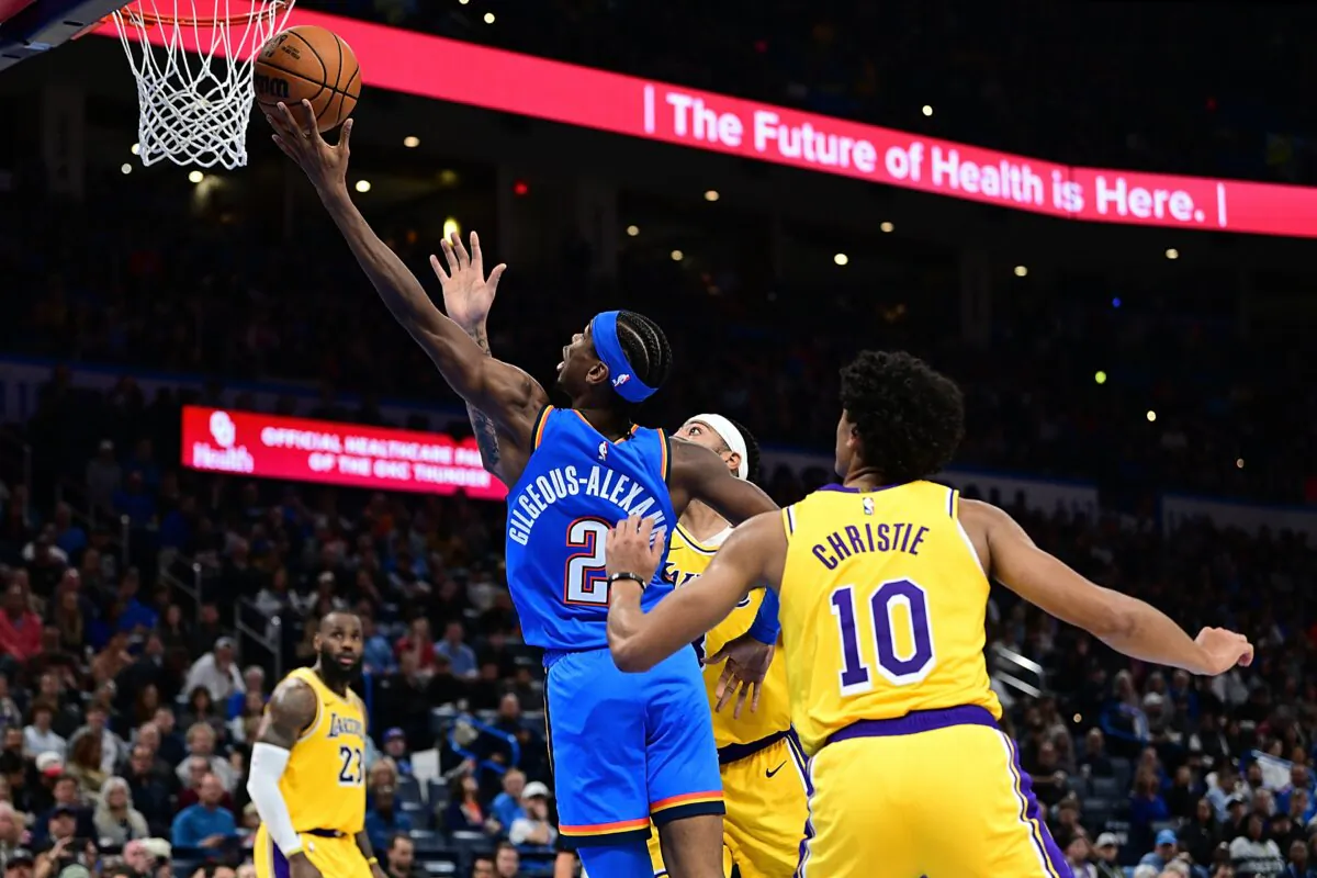 Shai Gilgeous-Alexander (2) of the Oklahoma City Thunder goes up for a layup during the second half against the Los Angeles Lakers in Oklahoma City on Nov. 30, 2023. (Joshua Gateley/Getty Images)