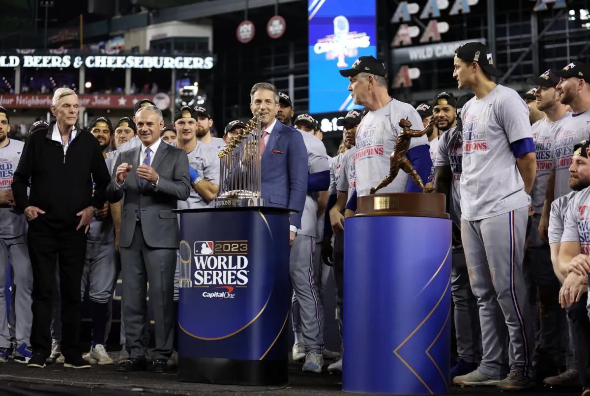 Sportscaster Kevin Burkhardt hosts the trophy ceremony after the Texas Rangers beat the Arizona Diamondbacks in Game Five to win the World Series at Chase Field in Phoenix on Nov. 1, 2023. (Christian Petersen/Getty Images)