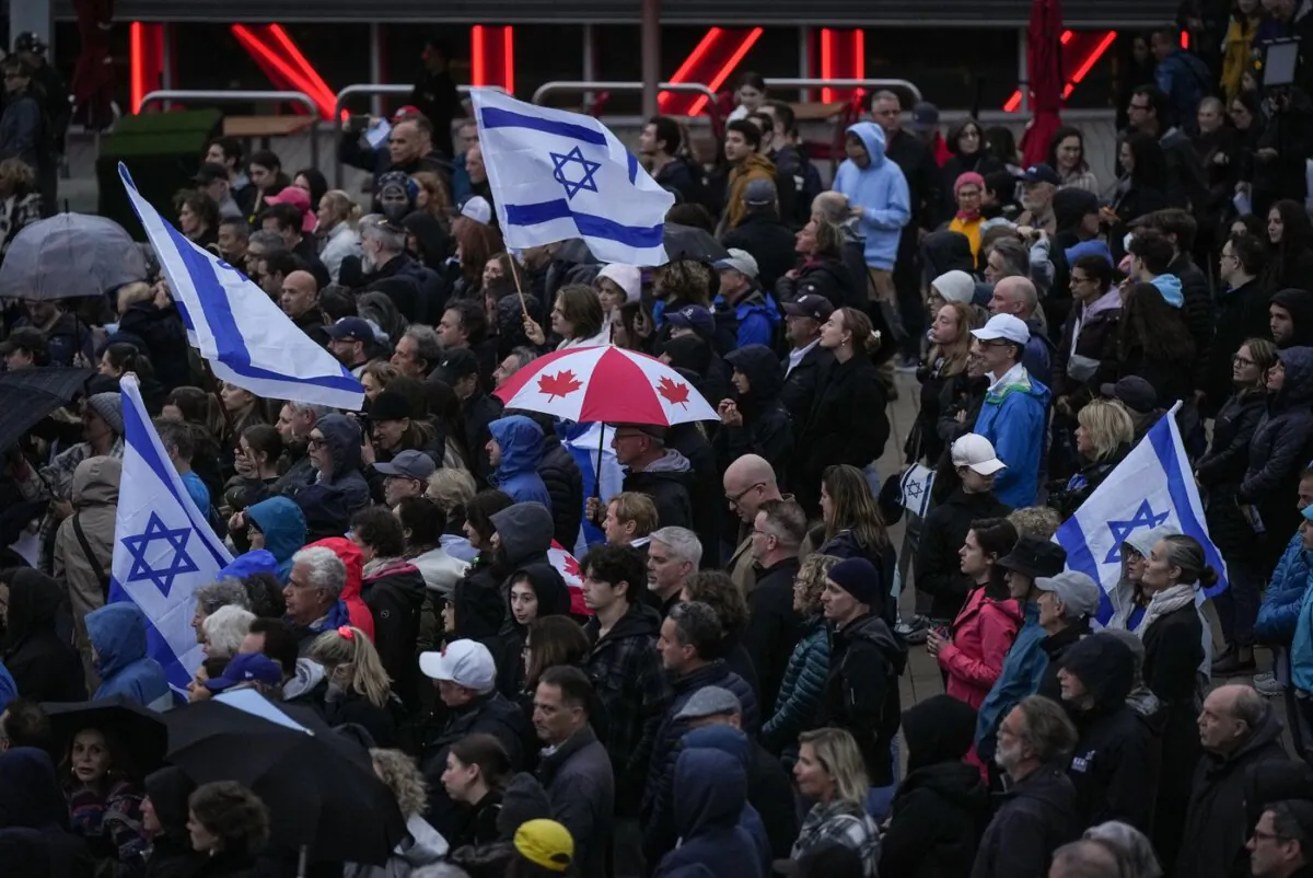 People attend a vigil organized by the Jewish Federation of Greater Vancouver in support of those killed in Israel, in Vancouver, on Oct. 10, 2023. (The Canadian Press/Darryl Dyck)