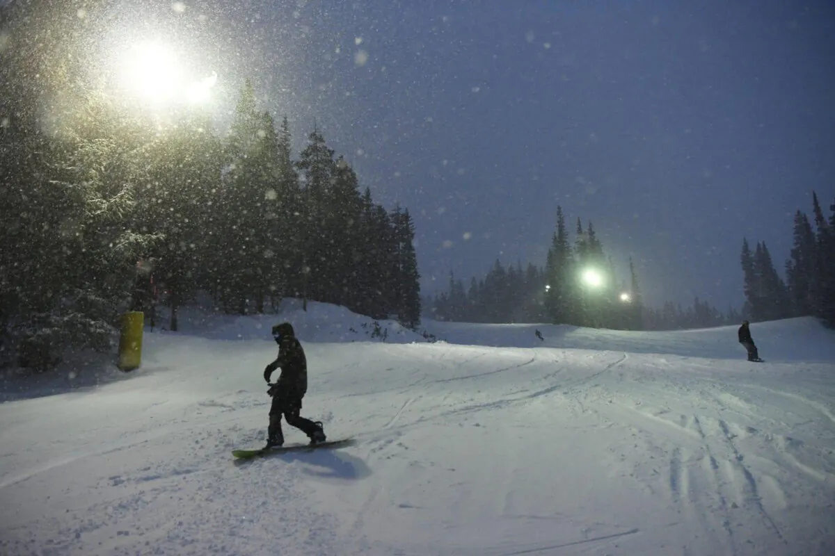 Night skiing and riding down the Schoolmarm run at Keystone Resort on Jan. 10. (Andy Cross/The Denver Post/TNS)