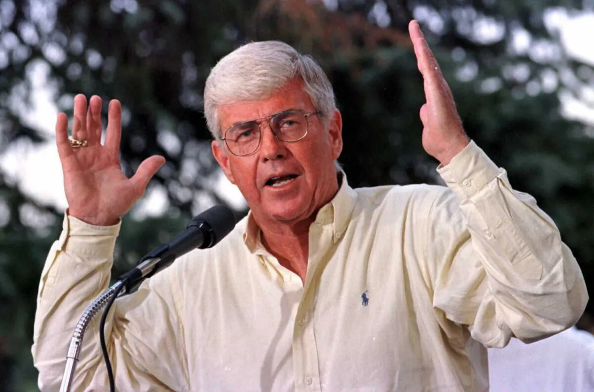 Then Republican vice presidential candidate Jack Kemp, former Secretary of Housing and Urban Development under President George H.W. Bush, gives a speech to a crowd of about 300 at a Labor Day block party, in Flint, Mich., on Sept. 2, 1996. (Matt Campbell/AFP via Getty Images)