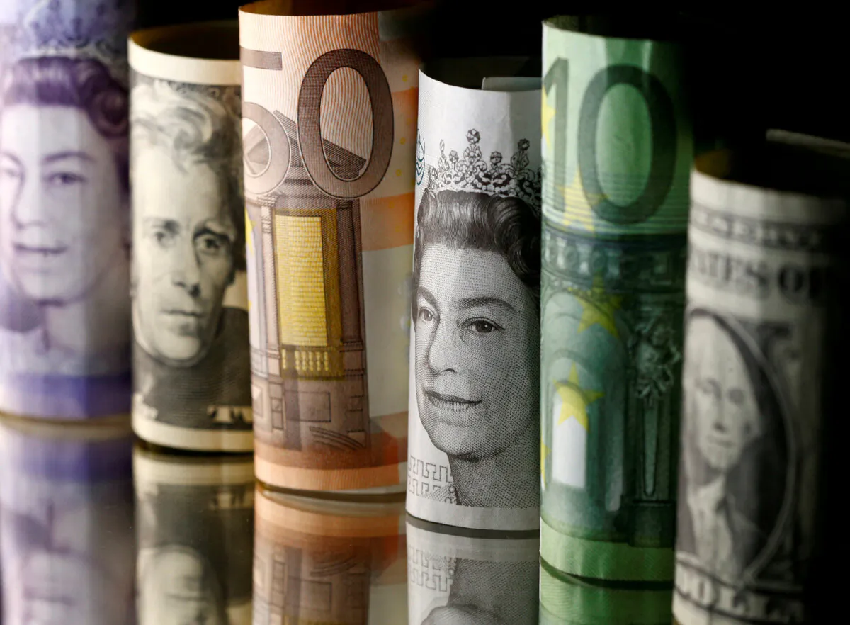 Dollar, Euro, and Pound banknotes are seen in this picture illustration taken on April 28, 2017. (Dado Ruvic/Reuters)