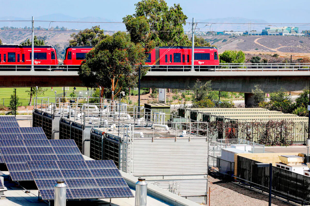 Energy storage containers with Lithium Ion batteries (R) are seen at the University of California San Diego in La Jolla, Calif., on Sept. 16, 2022. (Sandy Huffaker/AFP via Getty Images)