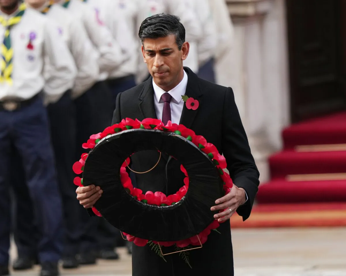 Prime Minister Rishi Sunak lays a wreath during the Remembrance Sunday service at the Cenotaph, in Whitehall, London, on Nov. 13, 2022. (Yui Mok/PA)