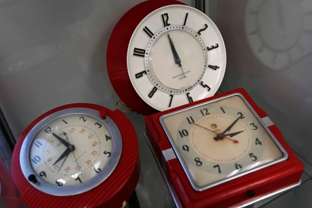 A selection of vintage clocks are displayed at the Electric Time Company, in Medfield, Mass., on March 9, 2023. (Charles Krupa/AP)
