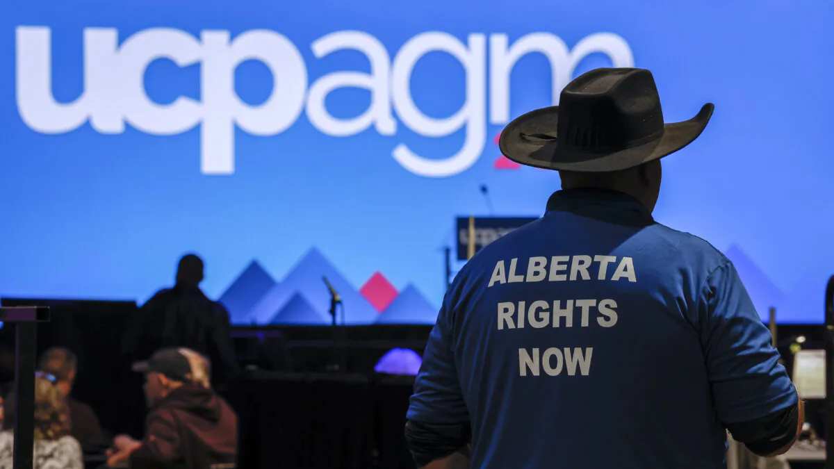 A United Conservative Party member arrives for the party's annual general meeting in Calgary on Nov. 3, 2023. (The Canadian Press/Jeff McIntosh)