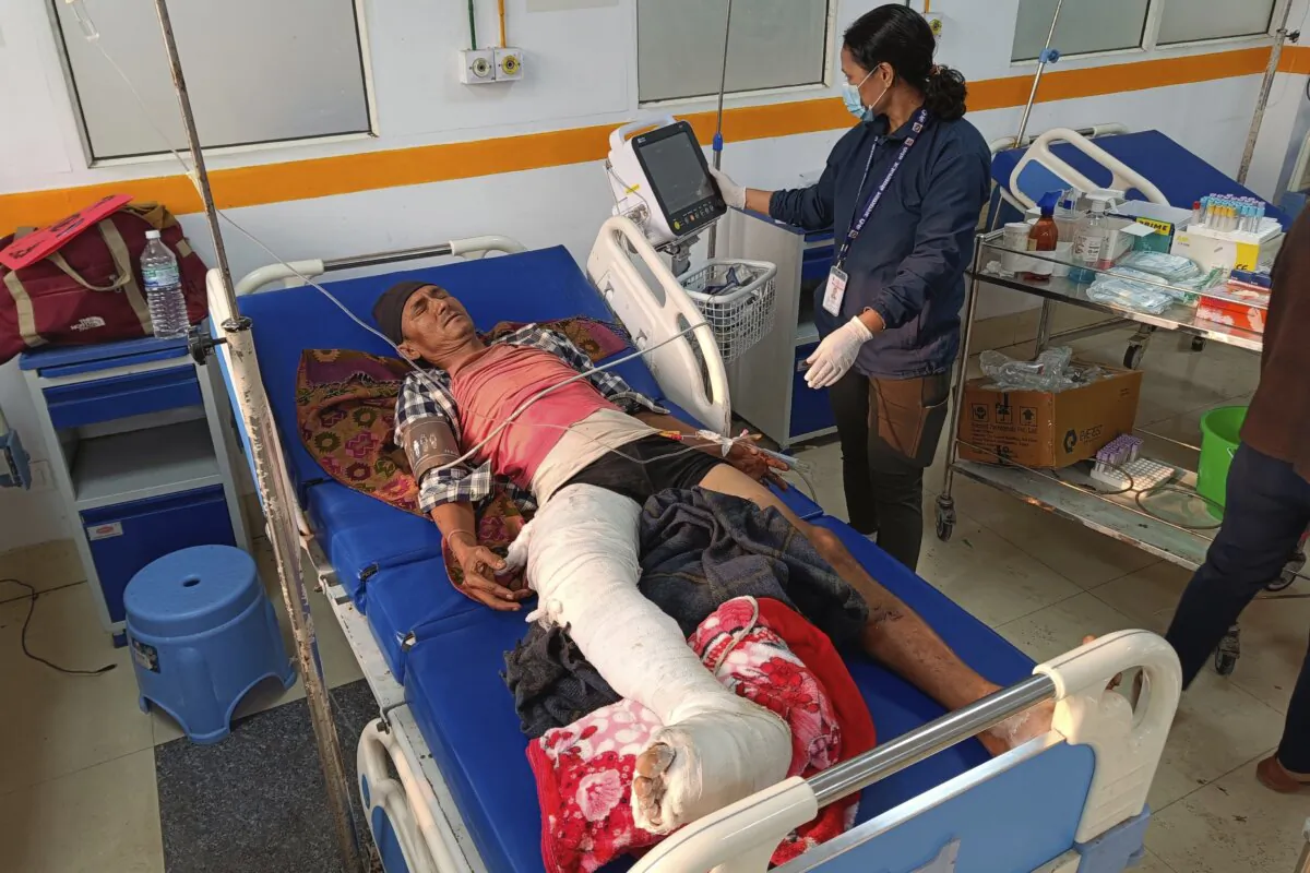 A doctor looks after a patient injured in an earthquake, evacuated from his village and brought to a hospital in Nepalgunj, Nepal, on Nov. 4, 2023. (Krishna Adikari/AP Photo)