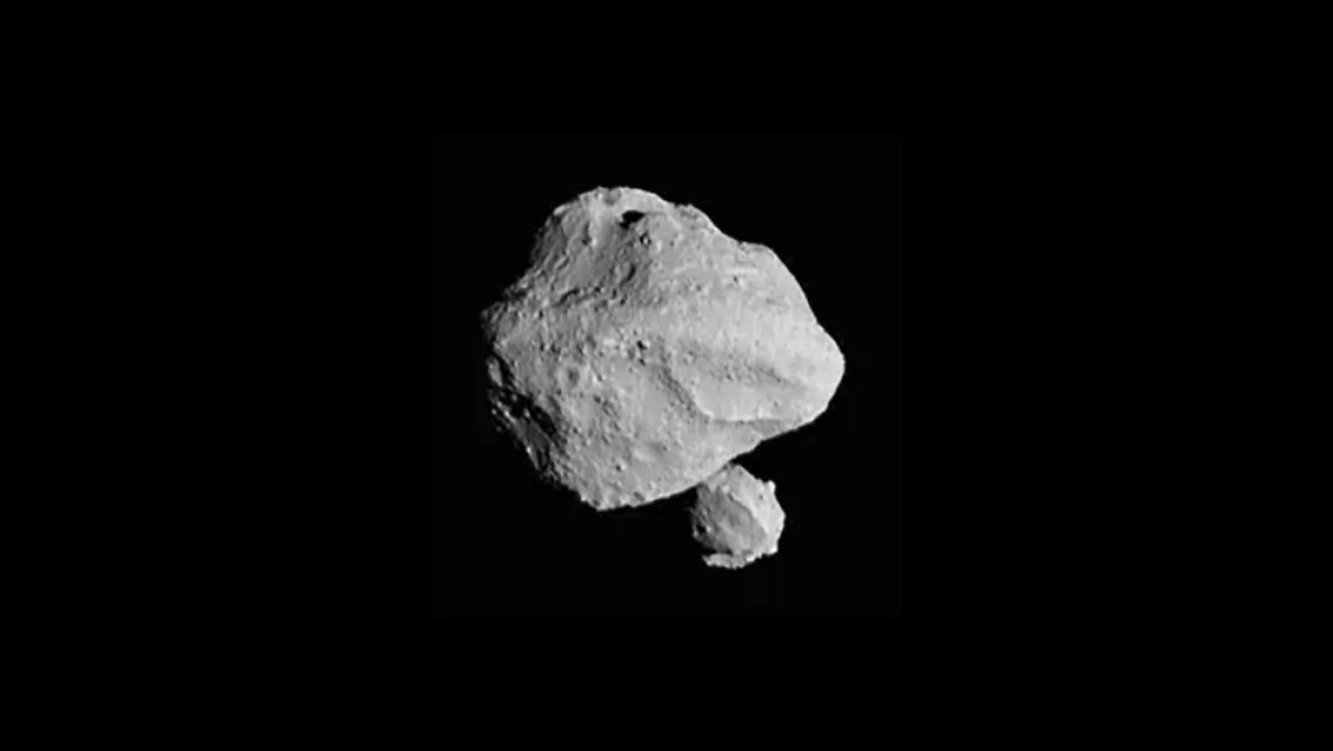 A photo taken by the Lucy spacecraft during Nov. 1, 2023 flyby of asteroid Dinkinesh, 300 million miles from Earth. (NASA via AP)