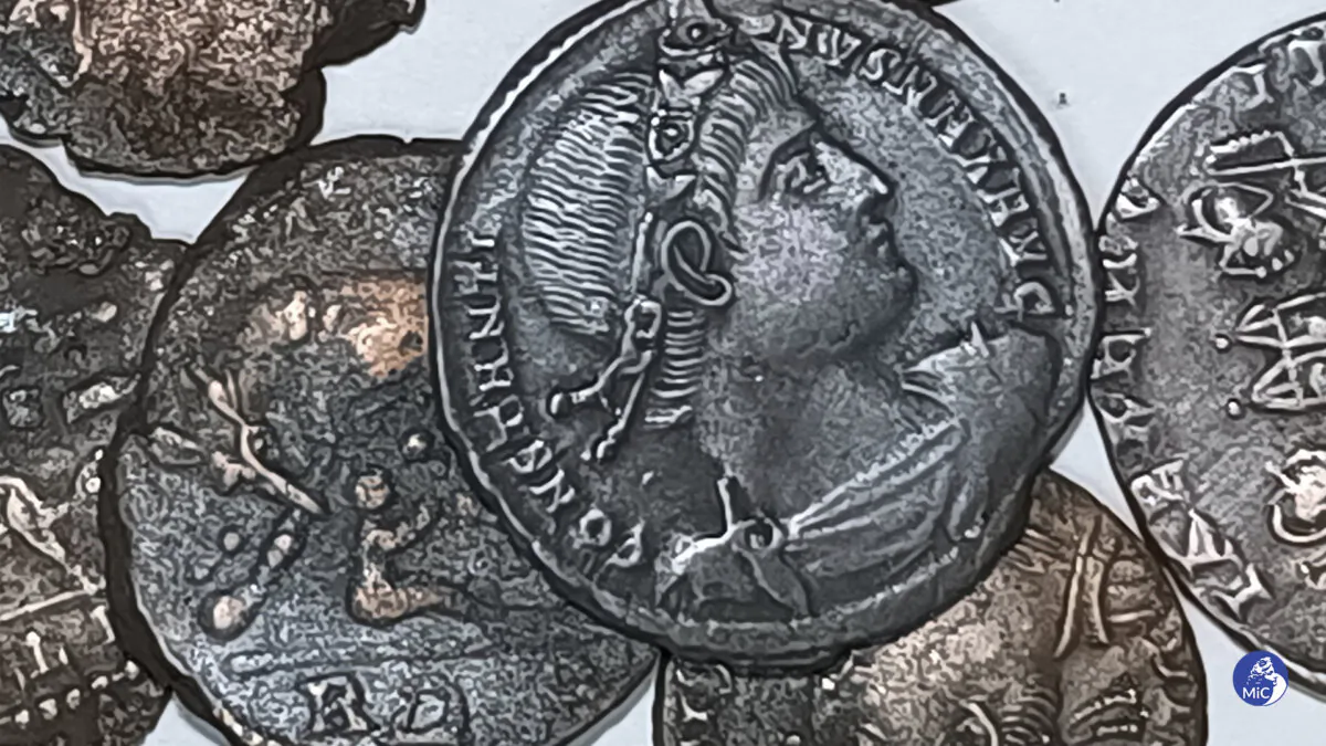 A picture made available by the Italian Culture Minister showing some of the discovered ancient bronze coins, on Nov. 4, 2023. (Italian Culture Ministry Via AP)