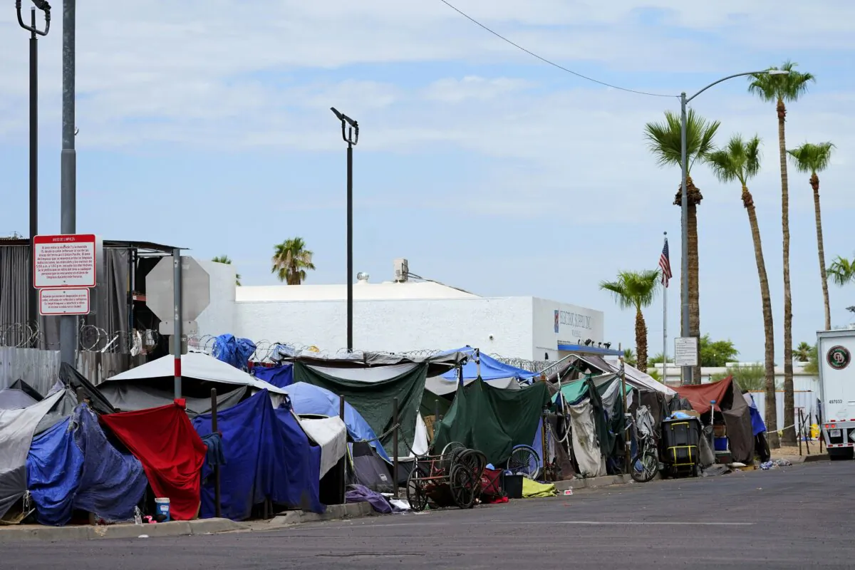 Tents line the street of "The Zone," a homeless encampment, in Phoenix on July 11, 2023. (Matt York/AP Photo)