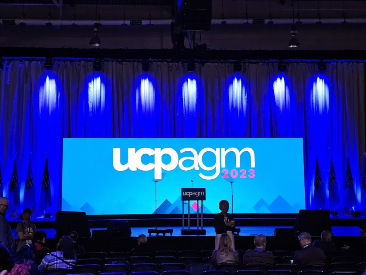 A screen displaying the title of Alberta's United Conservative Party's 2023 Annual General Meeting is seen at the BMO Centre in Calgary on Nov. 4, 2023. (Andrew Chen/The Epoch Times)