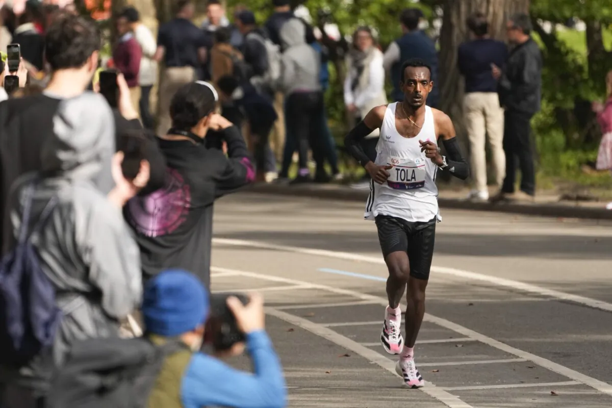 Tamirat Tola of Ethiopia runs though Central Park during the New York City Marathon on Nov. 5, 2023. (Seth Wenig/AP Photo)