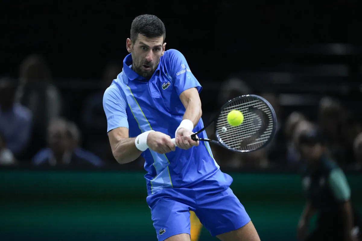Serbia's Novak Djokovic returns the ball to Bulgaria's Grigor Dimitrov during the final match of the Paris Masters tennis tournament at the Accor Arena in Paris on Nov. 5, 2023. (Michel Euler/AP Photo)