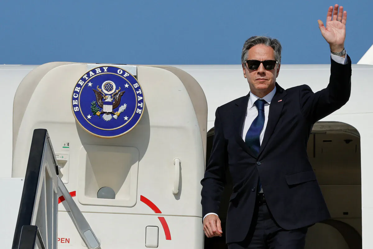 U.S. Secretary of State Antony Blinken boards a plane on his way to Cyprus at Ben Gurion International Airport in Tel Aviv, Israel, on Nov. 5, 2023. (Jonathan Ernst/Reuters)