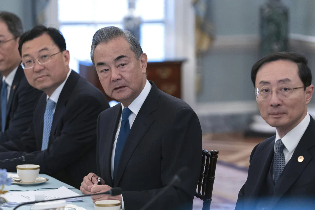 Chinese foreign minister Wang Yi (C) during a bilateral meeting with Secretary of State Antony Blinken at the State Department in Washington, on Oct. 27, 2023. (Jose Luis Magana/AP Photo)