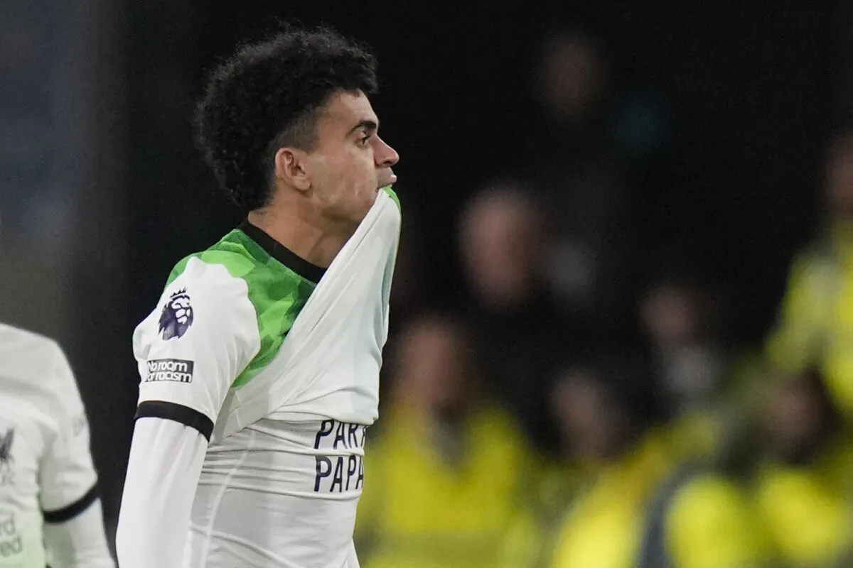 Liverpool's Luis Diaz celebrates after scoring his side's first goal during the English Premier League soccer match between Luton Town and Liverpool, at Kenilworth Road, in Luton, England, on Nov. 5, 2023. (Alastair Grant/AP)