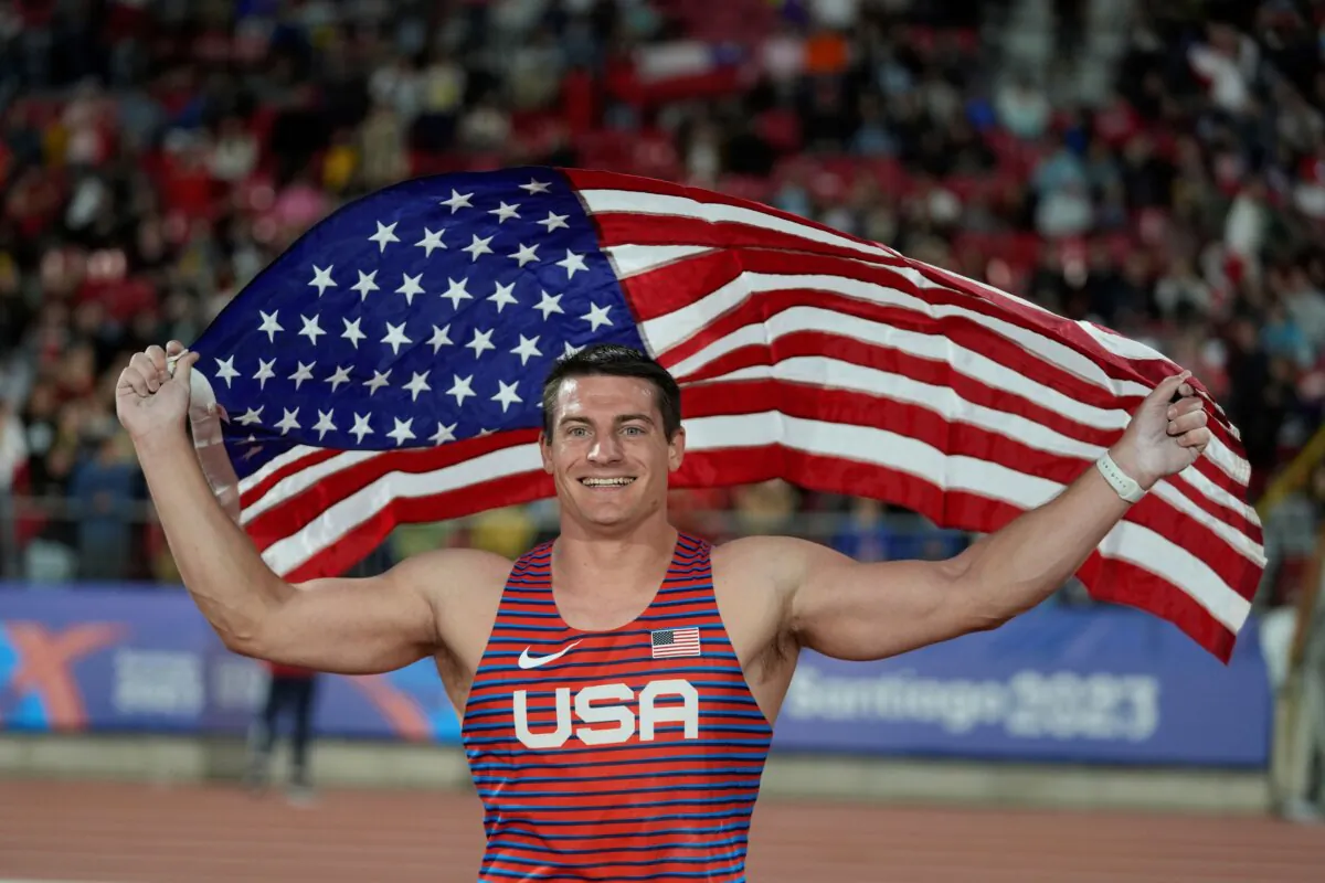 Matthew Ludwig of the United States celebrates winning the gold medal in the men's pole vault final at the Pan American Games in Santiago, Chile, on Nov. 4, 2023. (Fernando Vergara/AP Photo)