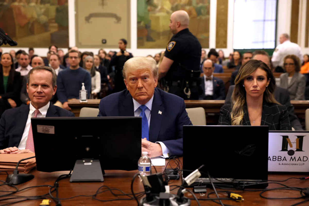 Former President Donald Trump sits in the courtroom with attorneys Christopher Kise and Alina Habba during his civil fraud trial at New York State Supreme Court in New York City on Nov. 6, 2023. (Brendan McDermid-Pool/Getty Images)