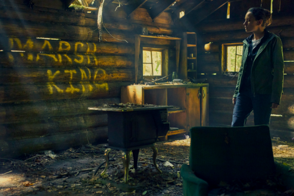 woman in log cabin in THE MARSH KING'S DAUGHTER 