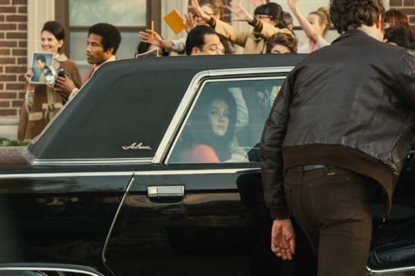 woman in car in PRISCILLA