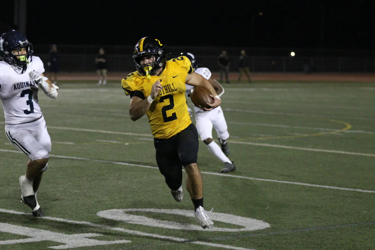 Senior running back Aaron Mitchell (No. 2) runs with the ball for Foothill High School’s football team in a recent game. (Courtesy of Gary Cunningham)