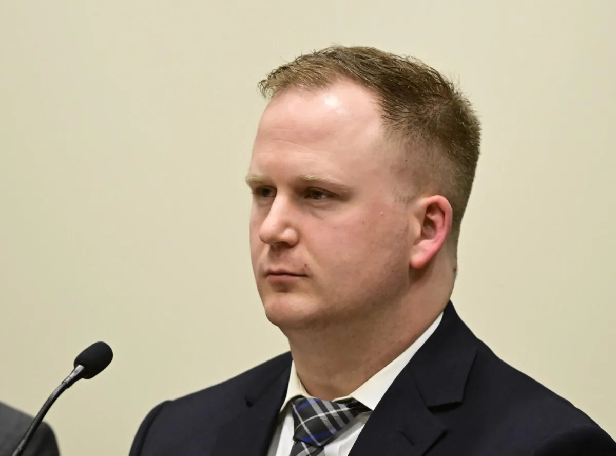 Aurora, Colo., police officer Nathan Woodyard attends an arraignment hearing after being charged in the 2019 death of Elijah McClain at the Adams County Justice Center in Brighton, Colo., on Jan. 20, 2023, (Andy Cross/The Denver Post via AP)