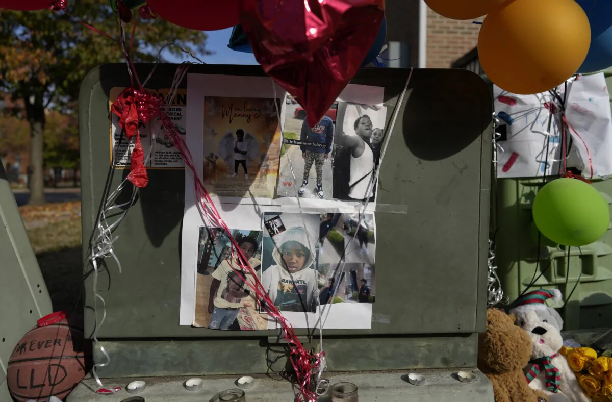 Images of Dominic Davis, an 11-year-old boy who was killed in a weekend shooting, are part of a makeshift memorial in Cincinnati, Ohio, on Nov 6, 2023. (Carolyn Kaster/AP Photo)