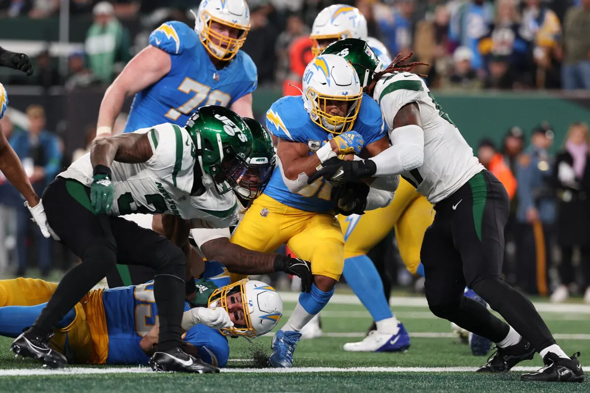 Austin Ekeler (30) of the Los Angeles Chargers scores a touchdown during the fourth quarter against the New York Jets at MetLife Stadium in East Rutherford, N.J., on Nov. 6, 2023 (Elsa/Getty Images)