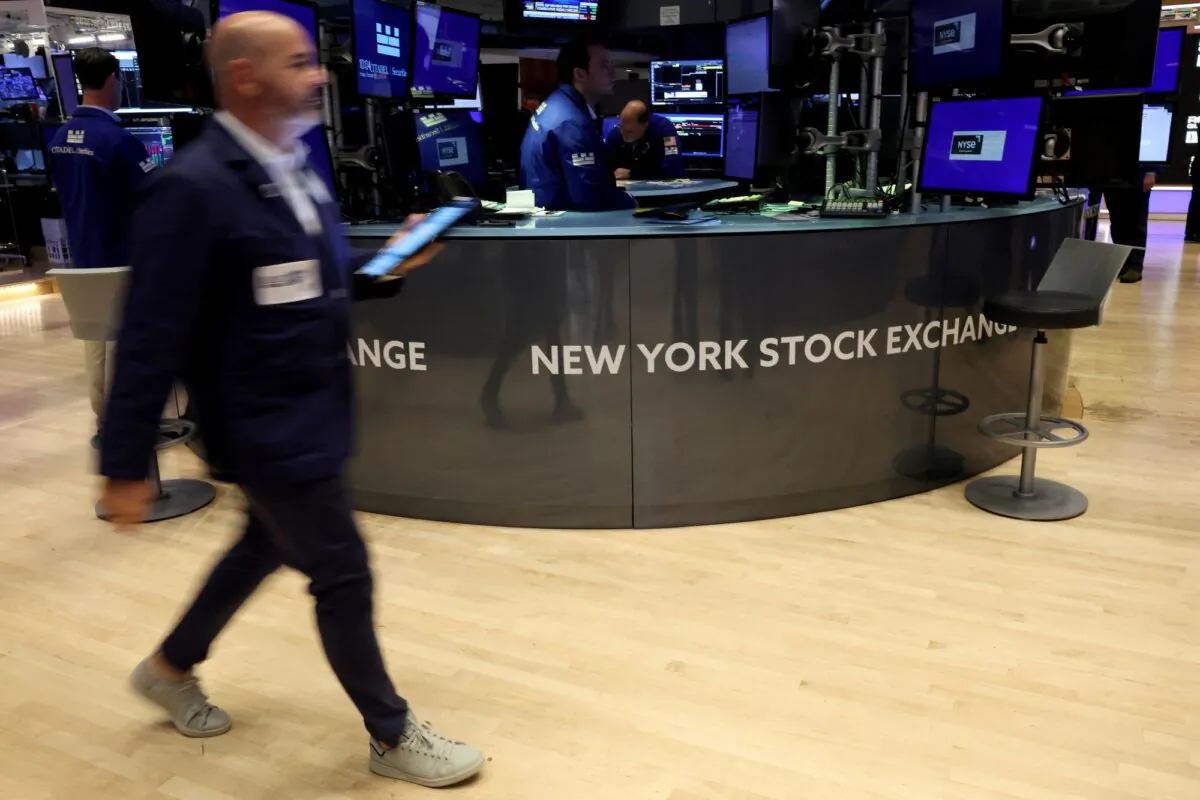 Traders work on the floor at the New York Stock Exchange (NYSE) in New York City on Oct. 27, 2023. (Brendan McDermid/Reuters)