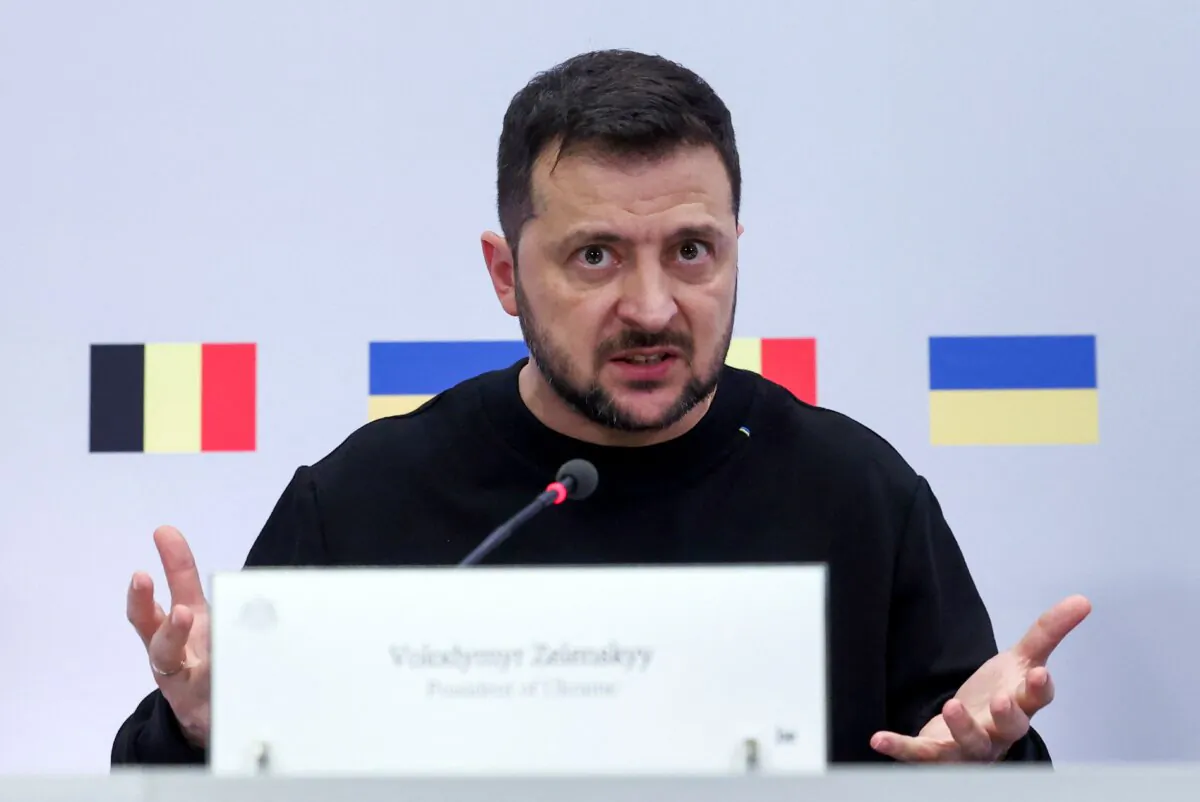 Ukraine's President Volodymyr Zelenskyy gestures during a joint press conference with Belgium's Prime Minister Alexander De Croo in Brussels, on Oct. 11, 2023. (Yves Herman/AFP via Getty Images)