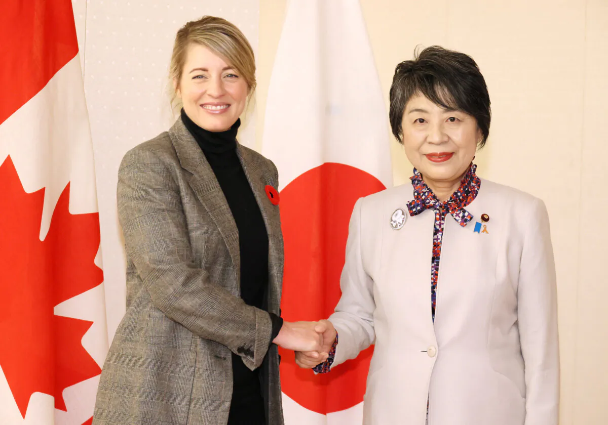 Canadian Foreign Minister Melanie Joly shakes hands with her Japanese counterpart Yoko Kamikawa prior to their talks, ahead of G7 Foreign Ministers' meeting, at Kamikawa's office in Tokyo on Nov. 7, 2023.   
(Reuters/Yoshikazu Tsuno)