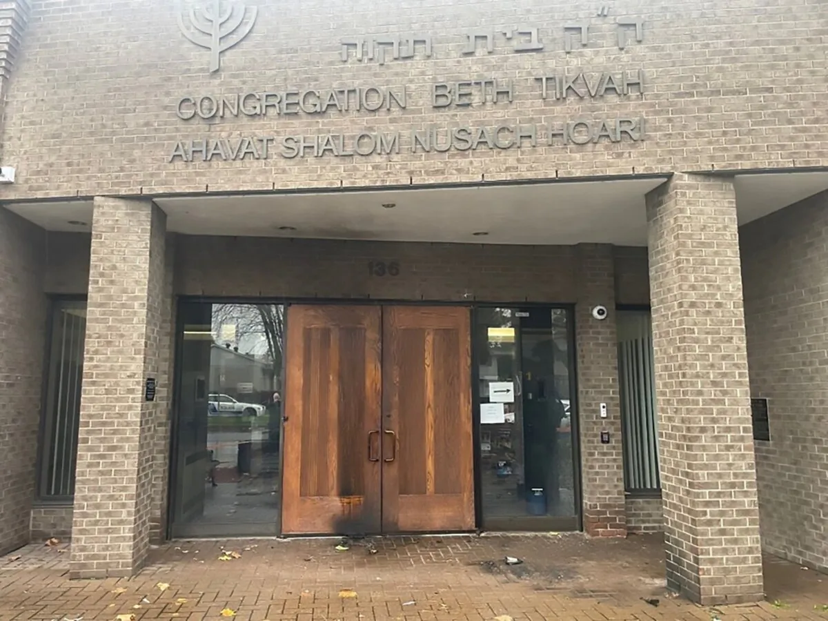 Fire damage is shown at the entrance of the Congregation Beth Tikvah in Dollard-Des Ormeaux, Que., in this handout photo. (The Canadian Press/HO - B'nai Brith Canada)