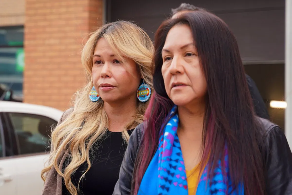 Dawn Walker (L) leaves provincial court after being sentenced in Saskatoon, on Nov. 2, 2023. (The Canadian Press/Heywood Yu)