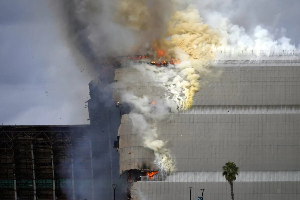 A historic blimp hangar burns in Tustin, Calif., on Nov. 7, 2023. (Jae C. Hong/AP Photo)