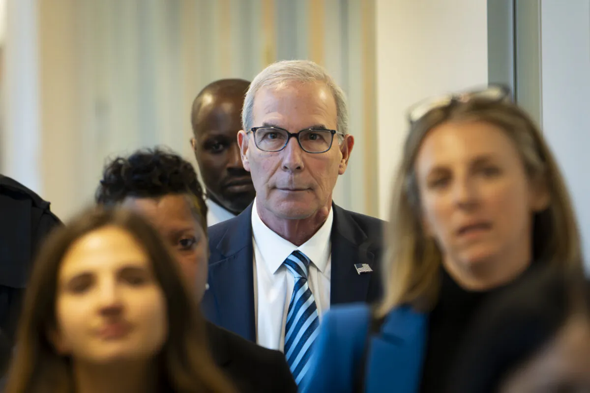 Special counsel David Weiss walks out of the closed-door testimony before the House Judiciary Committee in Washington on Nov. 7, 2023. (Madalina Vasiliu/The Epoch Times)