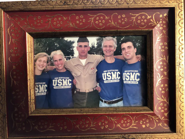 Andrew Smithwick (C) on the day of his graduation from Marine Corps Boot Camp at Parris Island on Oct. 22, 2004. About one especially arduous training test, Andrew wrote to his father: “To tell the truth, Dad, I love it.”  (L–R) Pictured here are also his sister, Eliza; mother, Ansley; father, Patrick; and brother, Paddy. (Courtesy of Patrick Smithwick)
