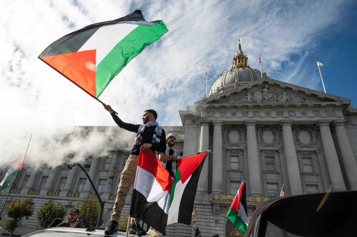 People take part in a "Palestine Solidarity" march in San Francisco on Nov. 4, 2023. Thousands of people, both Israeli and Palestinians, have died since October 7, 2023, after Palestinian Hamas militants based in the Gaza Strip, entered southern Israel in a surprise attack leading Israel to declare war on Hamas in Gaza the following day. (Amy Osborne/AFP via Getty Images)