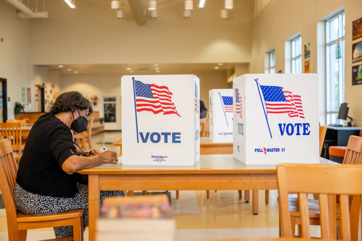 Minnie Bounds, 74, fills out her ballot at Blackburn Laboratory Middle School in Jackson, Miss., on Nov.7, 2023. (Brandon Bell/Getty Images)