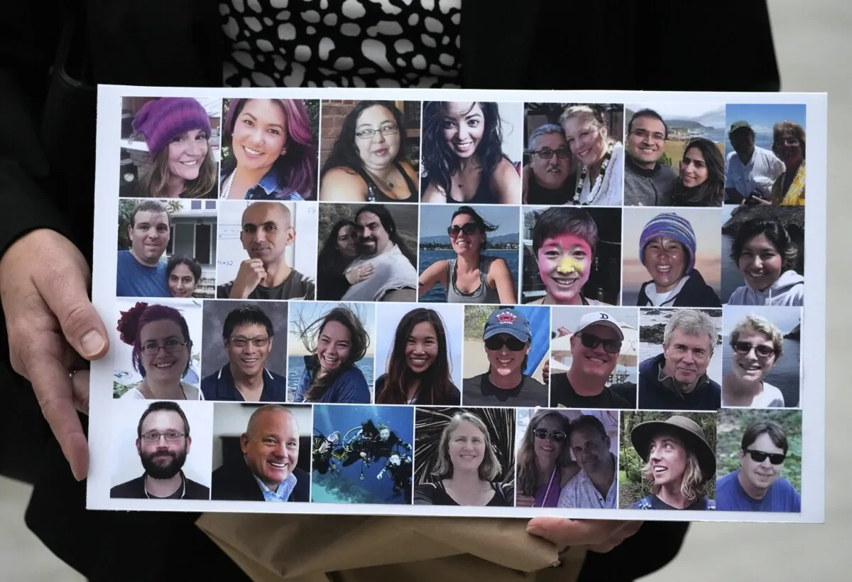 A photo collage of the 34 victims of the Sept. 2, 2019 fire aboard the dive boat, Conception, at Santa Cruz Island, is held by a family member arriving at federal court in Los Angeles on Oct. 25, 2023. (Damian Dovarganes/AP Photo)